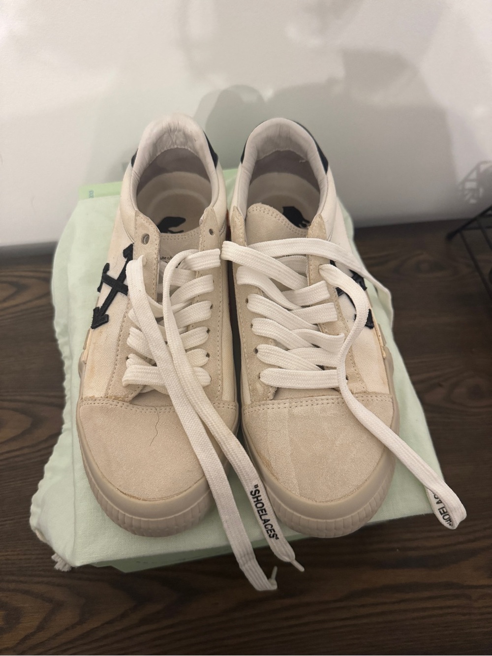 Off-White Cream Suede Low-Top Sneakers with Black Arrow Accent